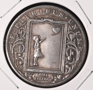 Banksy Hobo Art featuring the "Girl with Balloon" on a Morgan Dollar 